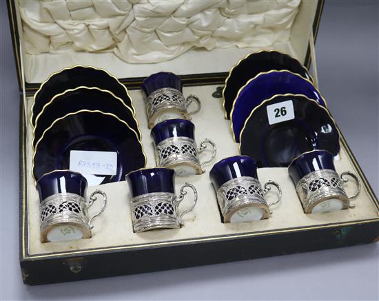 A cased Aynsley porcelain and silver mounted coffee set